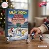 MLB x Snoopy 2026 Advent Calendar box featuring baseball-themed Snoopy and Woodstock figures on a wooden table.