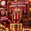 Front view of Monopoly Indiana University Hoosiers Collector Edition board game with a metallic logo token in the foreground.