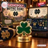 Close-up of a green metal shamrock game piece from the Monopoly Notre Dame Fighting Irish Collector Edition board game.