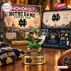 Front view of Monopoly Notre Dame Fighting Irish Collector Edition board game with a leprechaun figure in the foreground.