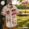 Front view of the Music Is My Medicine Button-Up Hawaiian Shirt hanging on a guitar outdoors.