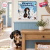 Front view of Naughty Dachshunds 2027 Wall Calendar hanging on a wall above a live dog holding a toy.