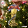 Close-up of a basketball-themed New York Knicks 2026 NBA Champions Championship ornament hanging on a pine tree.