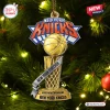 Front view of a New York Knicks 2026 NBA Champions championship ornament hanging on a lit Christmas tree.