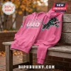 NFL 2026 Crucial Catch Pink Hoodie featuring Detroit Lions logo graphics on a wooden park bench.
