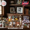 NFL Advent Calendar 2026 featuring assorted football player figurines and miniature team helmets on a wooden office desk.