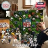 NFL Advent Calendar 2026 featuring numbered slots and miniature football helmet collectibles on a green grid background.