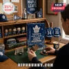 NHL Toronto Maple Leafs 2026 Advent Calendar box on a desk with team memorabilia and miniature hockey collectibles.