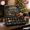 Notre Dame Fighting Irish Advent Calendar 2026 featuring 24 team-themed ornaments on a wooden table near a Christmas tree.