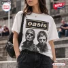 Front view of a white t-shirt featuring an Oasis band logo and black and white portrait graphic.