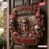 Ohio State Buckeyes Go Ducks Decorative Wreath with Brutus mascot, football stadium, helmets, and Go Bucks signage.