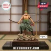 One Piece Roronoa Zoro Christmas ornament figurine holding three swords standing on a rock base with a gold hanging chain.