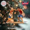 One Piece Monkey D. Luffy Christmas ornament featuring Luffy placing his straw hat on Nami while she kneels under a tree.