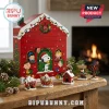 Peanuts Snoopy and Friends Christmas Advent Calendar 2026 featuring numbered red house doors and Peanuts character figurines.
