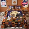 Peanuts Snoopy Halloween Character Throw Quilt Blanket featuring Charlie Brown, Lucy, and Linus in a pumpkin patch scene.