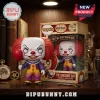 Pennywise x Cheshire Cat 1946-2006 Memorial Vinyl Figure with red balloon and purple and yellow jester-style suit.