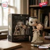 Front view of Phantom of the Opera 40th Anniversary Christine Daaé figure standing beside its commemorative display box.