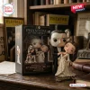 Front view of Phantom of the Opera 40th Anniversary Christine Daaé figure standing beside its display box.