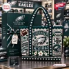 Philadelphia Eagles Crocheted Tote Bag featuring team logo, stadium graphic, and football motif in midnight green and cream.