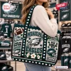 Philadelphia Eagles Crocheted Tote Bag featuring midnight green, silver, and white yarn motifs of footballs and logos.