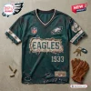 Front view of a distressed dark green Philadelphia Eagles NFL football t-shirt with ripped detailing.