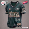 Front view of a dark teal Philadelphia Eagles football t-shirt featuring a distressed patch design and 1933 text.