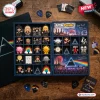 Top-down view of open Pink Floyd Little People Advent Calendar Blind Box containing small figures.