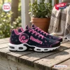 Side view of Pittsburgh Steelers x Breast Cancer Awareness Air Max Plus Sneakers with pink ribbons.