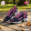 Side view of Pittsburgh Steelers x Breast Cancer Awareness Air Max Plus Sneakers with pink ribbons.
