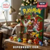 Pokemon Christmas Advent Calendar 2026 featuring 24 numbered doors with miniature character figures on a rustic table.