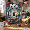 Front view of the Popeye 97th Anniversary Advent Calendar box on a wooden table with character figurines.