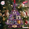 Tiered Christmas ornament featuring album cover art and a purple symbol hanging on a tree.