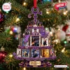 Front view of a purple multi-tiered Christmas ornament decorated with miniature album covers on a pine tree.