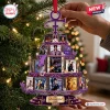 Hand holding a purple Prince iconic album covers Christmas ornament shaped like a multi-tiered tree.