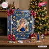 Front view of a blue Princess Diana 65th Anniversary Ornament Advent Calendar with hanging decorations on a wooden table.
