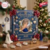 Front view of a blue Princess Diana 65th Anniversary Ornament Advent Calendar with royal decorations on a wooden table.