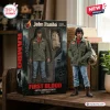 Front view of a Rambo First Blood 45th Anniversary Hot Toys figure standing beside its themed display box.