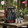 Front view of a Rambo First Blood 45th Anniversary Hot Toys figure standing on a wooden table in a forest setting.