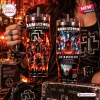 Close-up of two Rammstein Live In Mexico City 2026 Stanley tumblers with band imagery and fire graphics.