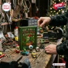 Rat Fink 2026 Filthy Xmas Garage Advent Calendar box with miniature Rat Fink figures and car models on a wooden workbench.