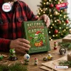Rat Fink 2026 Filthy Xmas Garage Advent Calendar green box with Ed Roth character graphics held in a plaid shirt backdrop.