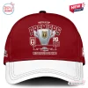 Front view of a maroon baseball cap featuring a Redcliffe Dolphins 2026 Hostplus Cup Premiers graphic.