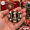 Close-up view of a San Francisco 49ers themed poker chip featuring a Vince Lombardi trophy graphic.