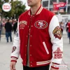 Front view of a San Francisco 49ers Football Mascot Baseball Jacket worn outside.