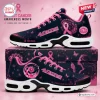 Side view of San Francisco 49ers x Breast Cancer Awareness Air Max Plus Sneakers with pink ribbon graphics.