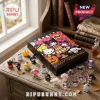 Sanrio Hello Kitty Halloween 2026 Advent Calendar box with miniature collectible figures on a wooden tabletop.