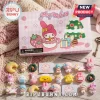 Sanrio My Melody Christmas Advent Calendar 2026 box with small character figurines arranged on a knit blanket backdrop.