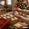 Santa Claus 250th Anniversary Advent Calendar glass ornaments set held in hands above a decorative gift box.