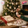 Santa Claus 250th Anniversary Advent Calendar with miniature glass ornaments, red box, and festive holiday tree background.