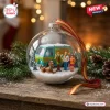 Clear glass ornament with Mystery Machine van and cartoon characters inside on a snowy surface.